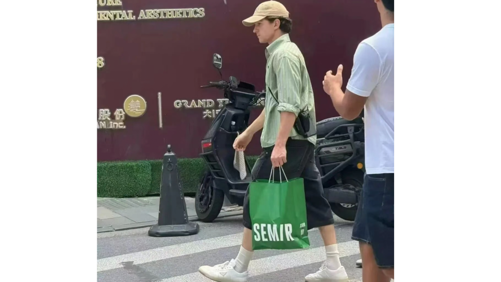 Tom Holland Accidentally Endorses Chinese Apparel Brand Semir During ‘Spider-Man’ Press Tour With Zendaya